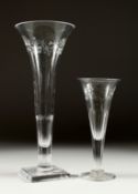 A LARGE WILLIAM YEOWARD ENGRAVED TRUMPET SHAPED BUNNY VASE, 12 ins high and a trumpet vase. 8ins