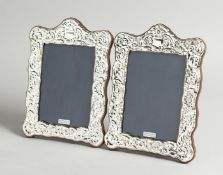 A PAIR OF SILVER PHOTOGRAPH FRAMES 7.5 x 5.5ins
