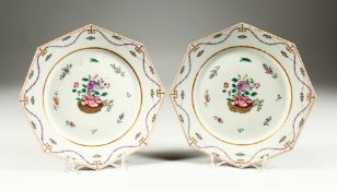 A PAIR OF SAMSON OF PARIS FAMILLE ROSE OCTAGONAL PLATES with roses. 9ins diameter