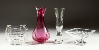 A PINK WATERFORD VASE, 9ins high. A SQUARE VASE AND TALL VASE, 9ins high and bowl 4.5ins long. (4).