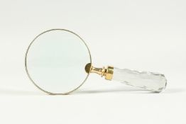 A MAGNIFYING GLASS WITH CUT GLASS HANDLE