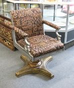 A HIGHLY ORNATE CAST AND POLISHED STEEL AND BRASS REVOLVING ARMCHAIR, possible originally a barber's