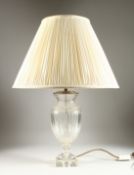 A CUT GLASS LAMP AND SHADE