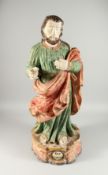 AN 18th CENTURY ITALIAN POLYCHROME FIGURE OF SAINT JOSEPH. Inscribed 26ins high