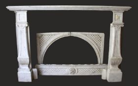 A GOOD CARVED MARBLE FIREPLACE, with broad mantle supported on a pair of classical columns, a carved