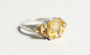 A SILVER AND CITRINE RING