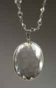 A SILVER AND CRYSTAL PENDANT AND NECKLACE.