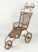 A CHILD'S VICTORIAN CANE DOLL'S PRAM