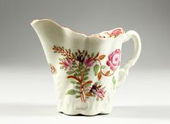 A WORCESTER HIGH CHELSEA EWER painted with Chinese style flowers
