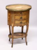 A GOOD 19TH CENTURY FRENCH OVAL THREE DRAWER COMMODE, with brass grill and marquetry inlay on curing