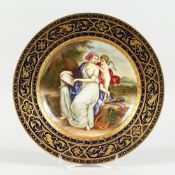 A GOOD VIENNA CIRCULAR PLATE,blue and gilt border, the centre painted with a classical scene,