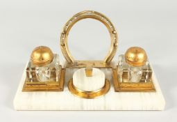 A GOOD PLATED ONYX EQUESTRIAN TABLE INKWELL with horse shoe and jockey caps. 10.5ins long