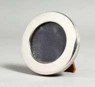 A PLAIN CIRCULAR PHOTOGRAPH FRAME 2.5ins London 1982