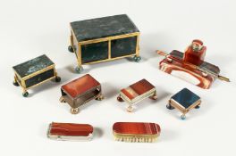 A GOOD MOSS AGATE AND ORMOLU CASKET, 5ins wide, together with a similar smaller casket, two stamp