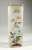 A FRENCH OPAQUE SQUARE SHAPED GLASS VASE painted with flowers. 11.75ins high.