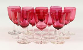 TWELVE VICTORIAN CRANBERRY GLASS WINES.