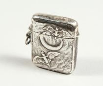 A CAST SILVER MOON AND BAT VESTA CASE
