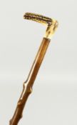 A VICTORIAN BONE HANDLED WALKING STICK, with blackthorn handle.
