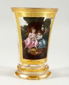 A SUPERB VIENNA GLASS BEAKER painted with a panel of two children. 4.5ins high.