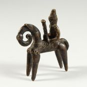 A TRIBAL BRONZE 4ins high.