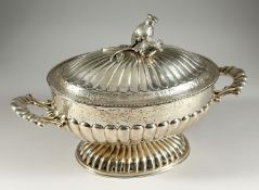 A LARGE CONTINENTAL SILVER TWO HANDLED OVAL TUREEN AND COVER, semi fluted with engraved