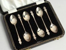A SET OF SIC STERLING SILVER COFFEE SPOONS cased Sheffield 1908