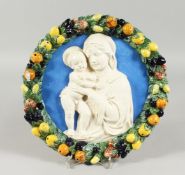 A DULA ROBIN ITALIAN CIRCULAR POTTERY MADONNA CHARGER 12ins diameter.