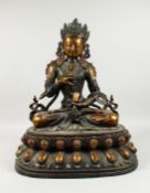 A LARGE CHINESE BRONZE SEATED GOD set with stones 24ins high.
