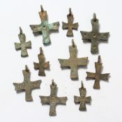 TEN SMALL ROMAN IRON CROSSES 1ins long
