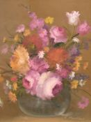 N. Mueller (20th century) A still life of mixed flowers in a vase, oil on canvas, signed, 10