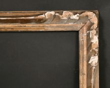 A carved wood frame, 10.5
