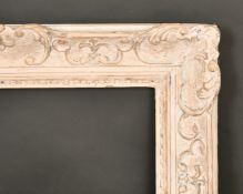 An early 20th century carved wood frame, rebate size 19.5
