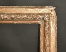 A 19th century carved frame, rebate size 21.25