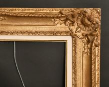 A gilt composition frame, rebate size 19.75