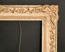 An early 20th century gilt composition frame, rebate size 20