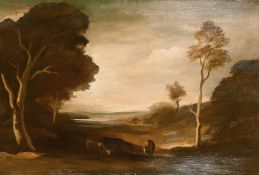 Philip Hugh Padwick (1876-1958) British, A scene of cattle feeding in a vale, oil on canvas, signed,