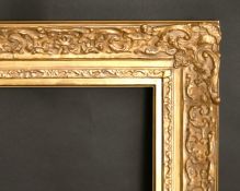 A gilt composition frame, wide rebate 23