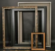 A group of four ebonised and painted frames, dimensions 24