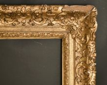 A French 18th century carved wood frame, rebate size 38.5