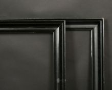 A pair of early 20th century ebonised frames, rebate size each 29