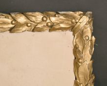 A foliate carved oak frame, rebate size 15