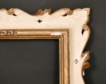 An early 20th century French carved and painted frame, rebate size 16