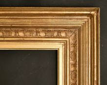A shaped and composition gilt frame, 33.25