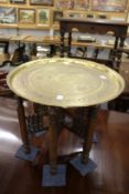 An eastern brass tray table.