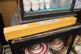 A Chinese scroll, boxed.