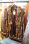 A ladies' fur coat.