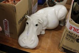 A pottery model of a hippo.