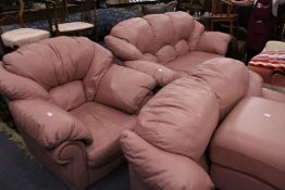 A four piece upholstered lounge suite.