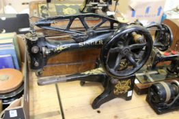 An unusual large tailor's Singer sewing machine.