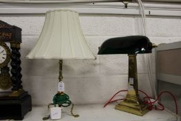 Two brass lamps.